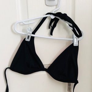 Pink bathing suit black top